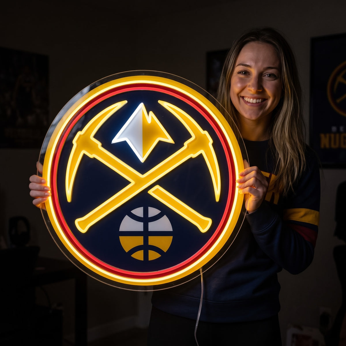 Woman holding a glowing Denver Nuggets LED neon sign