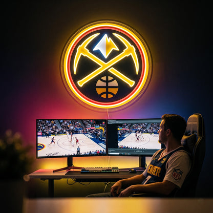 Denver Nuggets LED neon sign above a gaming setup with a fan watching basketball