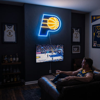 Indiana Pacers LED neon sign glowing above the TV in a basketball man cave