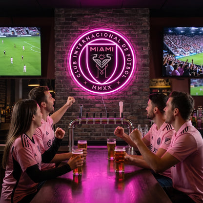 Inter Miami CF LED neon sign in a sports bar with fans watching the match