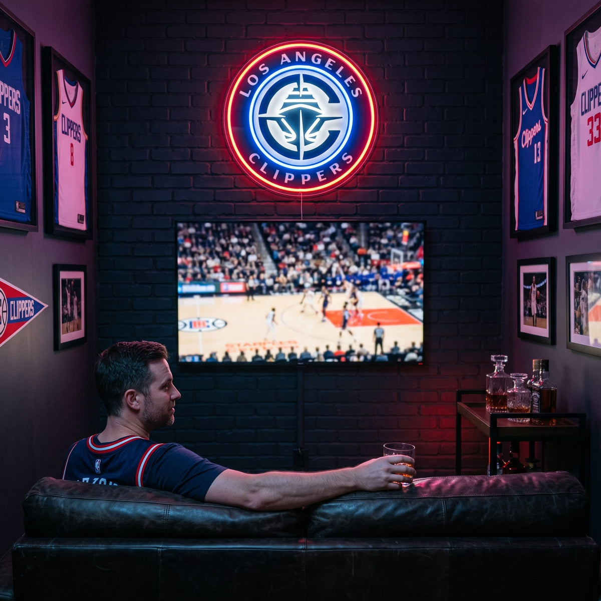 Los Angeles Clippers LED neon sign glowing above the TV in a basketball man cave