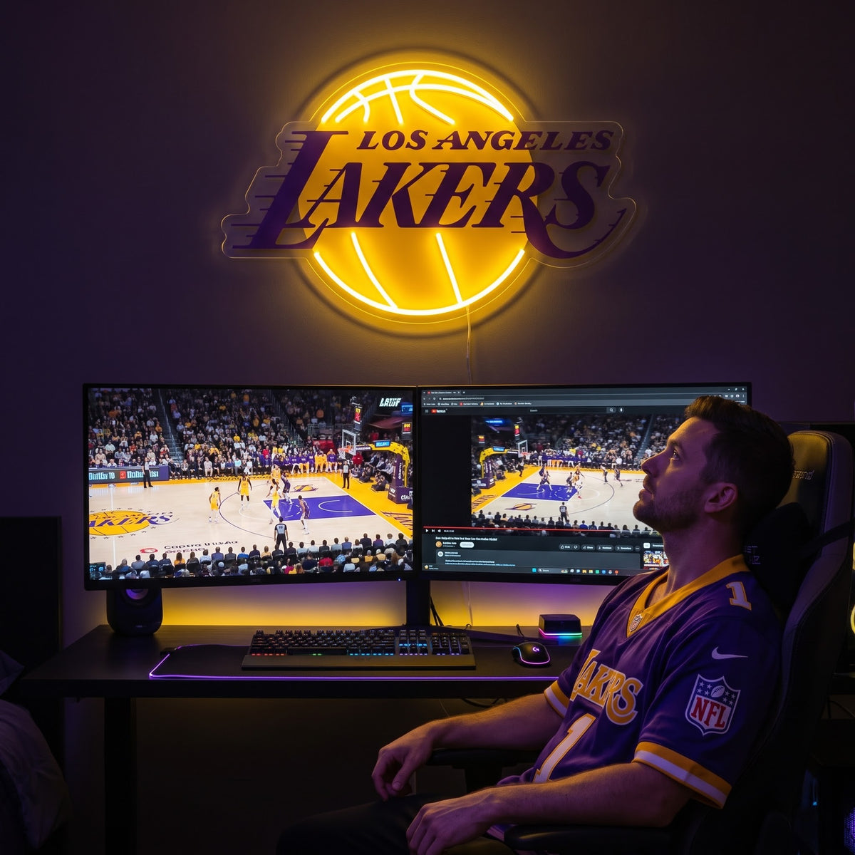 Los Angeles Lakers LED neon sign above a gaming setup with a fan watching basketball