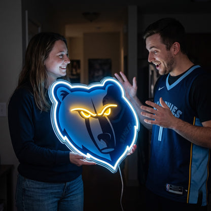 Woman surprising a basketball fan with a glowing Memphis Grizzlies LED neon sign gift