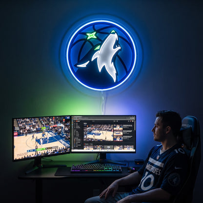 Minnesota Timberwolves LED neon sign above a gaming setup with a fan watching basketball
