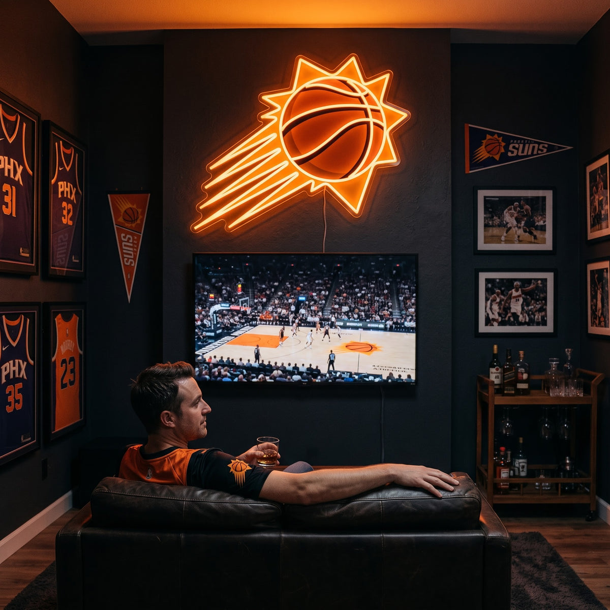 Phoenix Suns LED neon sign glowing above the TV in a basketball man cave