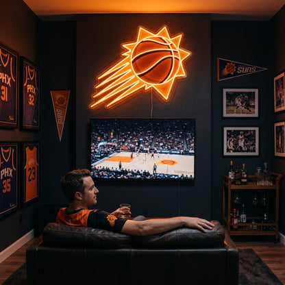 Phoenix Suns LED neon sign glowing above the TV in a basketball man cave