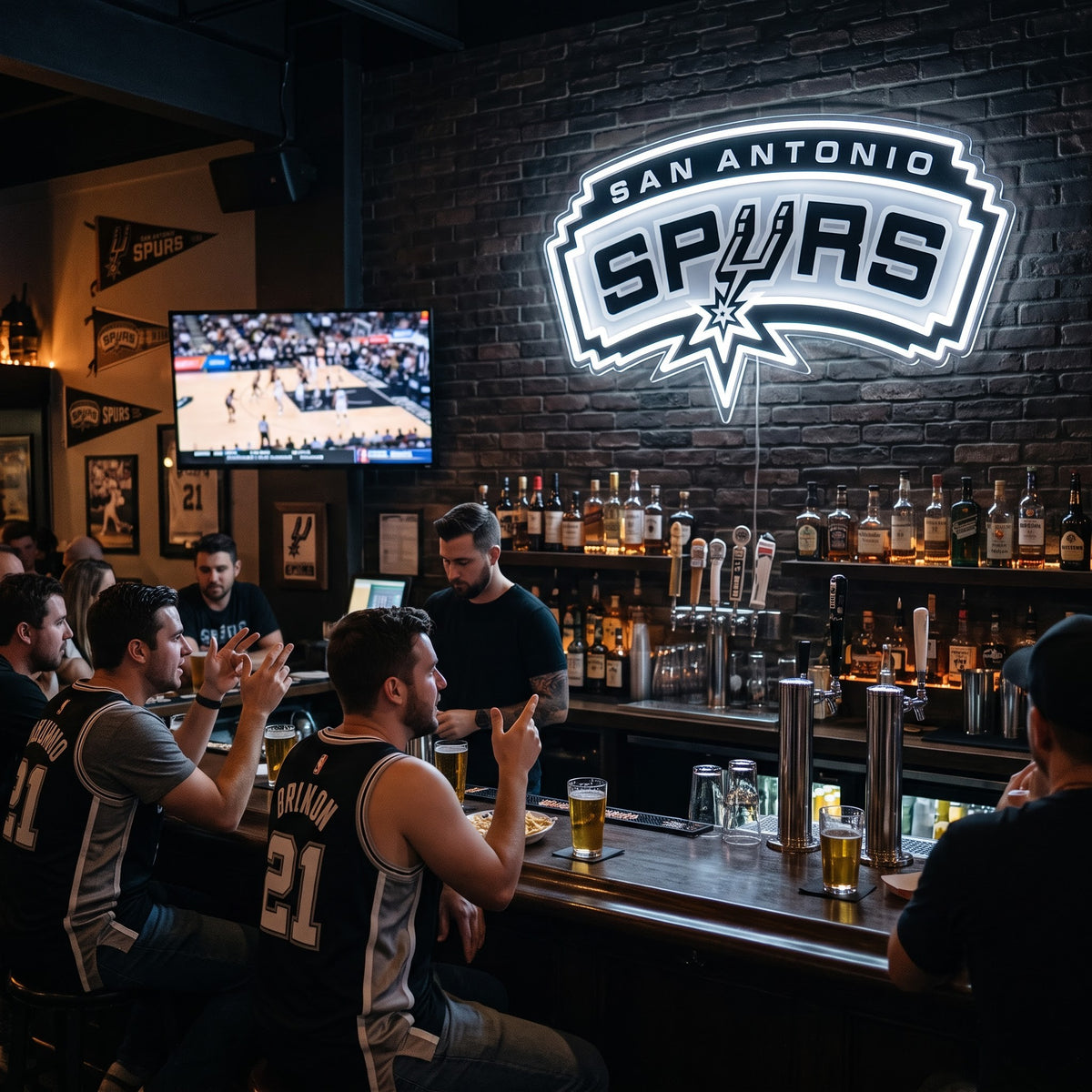 San Antonio Spurs LED neon sign on a brick wall in a sports bar with fans watching the game