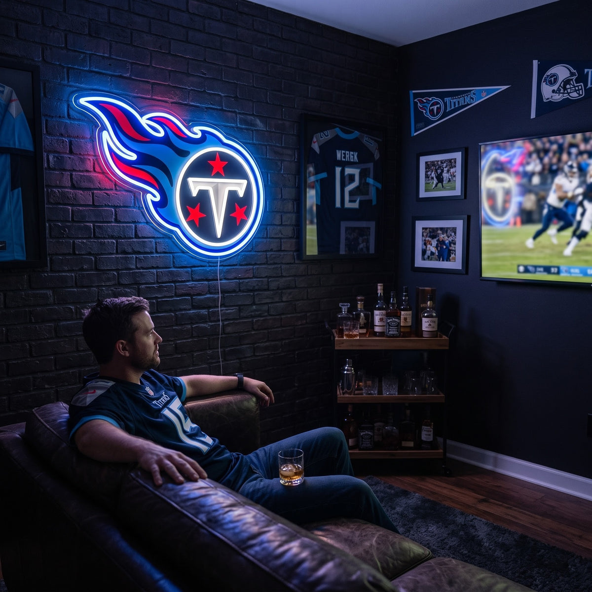 Tennessee Titans flame logo LED neon sign above a leather sofa in a football fan's man cave.