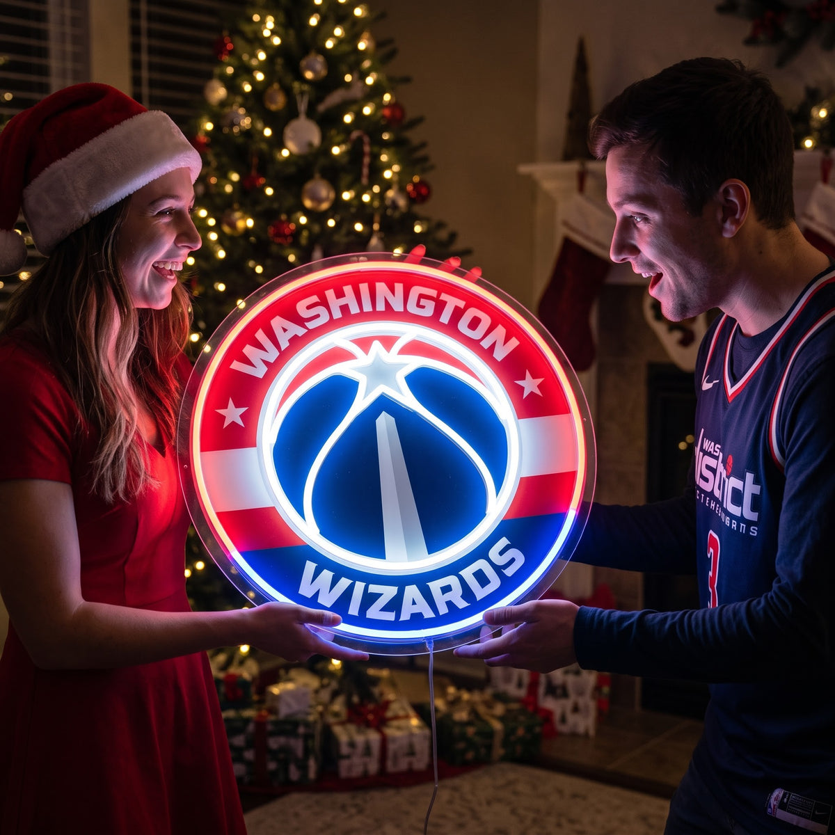 Couple exchanging a Washington Wizards LED neon sign as a Christmas gift by the tree