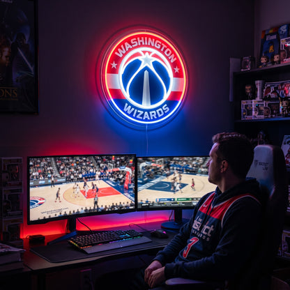Washington Wizards LED neon sign above a gaming setup with a fan watching basketball