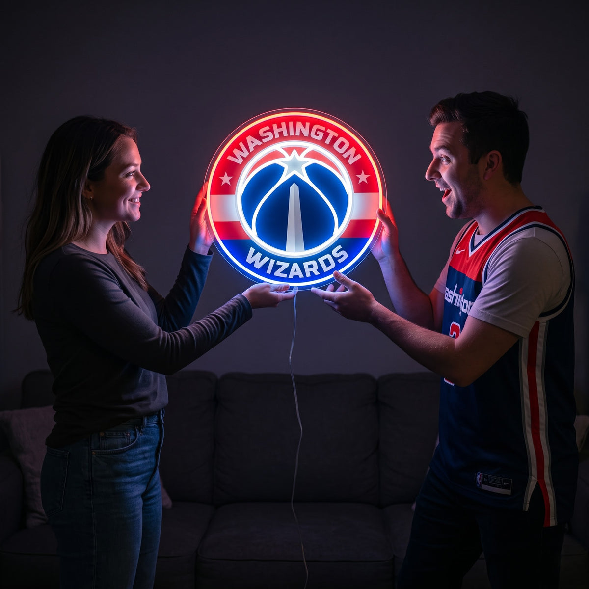 Woman surprising a basketball fan with a glowing Washington Wizards LED neon sign gift
